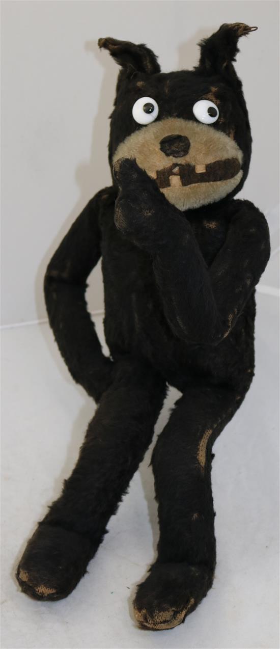 An early black plush straw filled model of Felix The Cat, 18in.